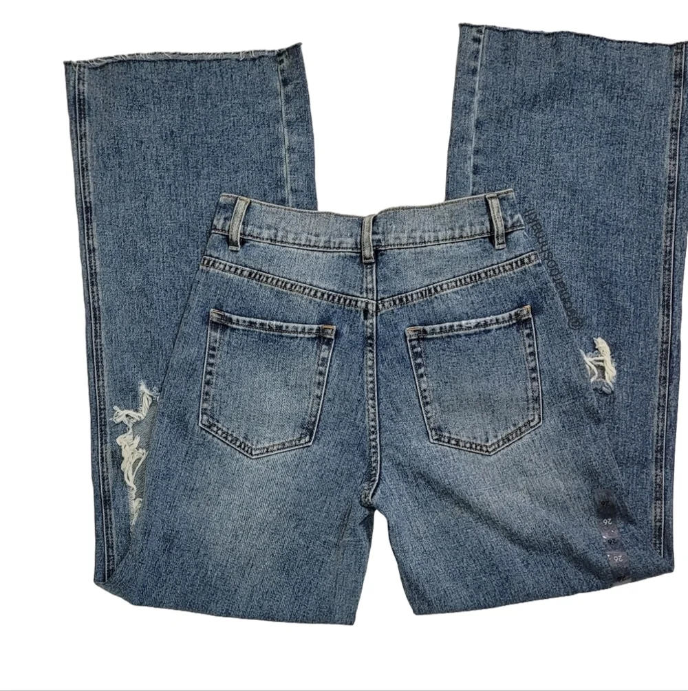 Women's Distressed Blue Jeans